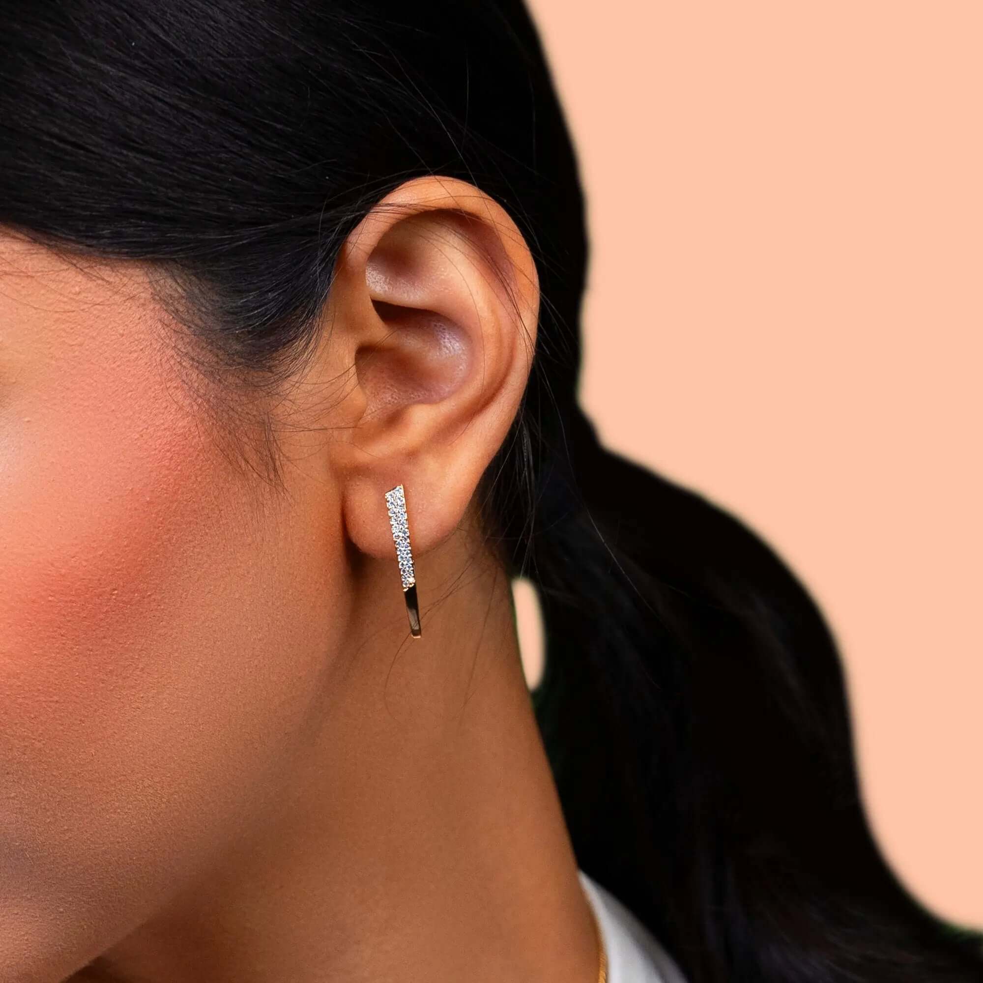 Elegant rose gold American diamond earrings for women – premium fashion jewellery with sleek modern design, ideal for parties, weddings, or festive wear by Own It Pure.
