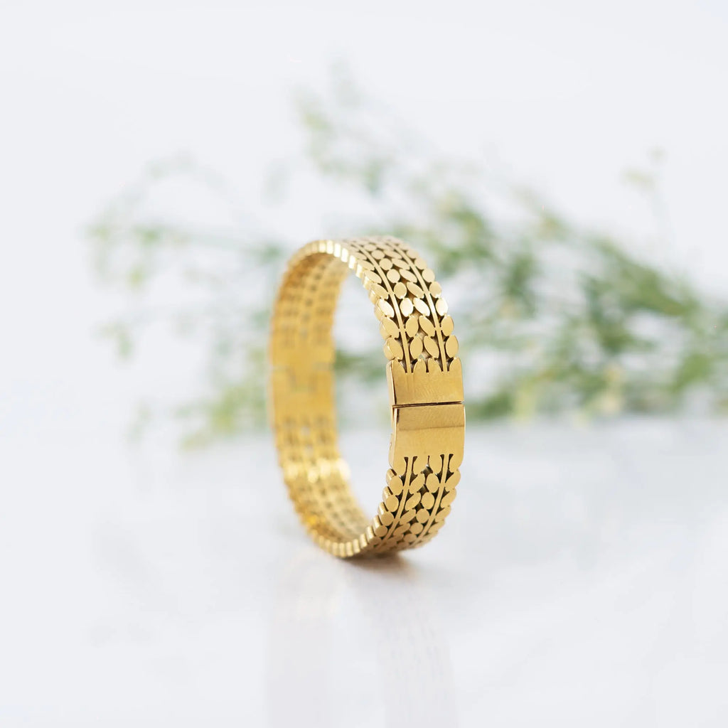 Trendy gold-plated designer bracelet for women – premium fashion jewellery with intricate link pattern, perfect for wedding, festive looks, or daily wear styling by Own It Pure.