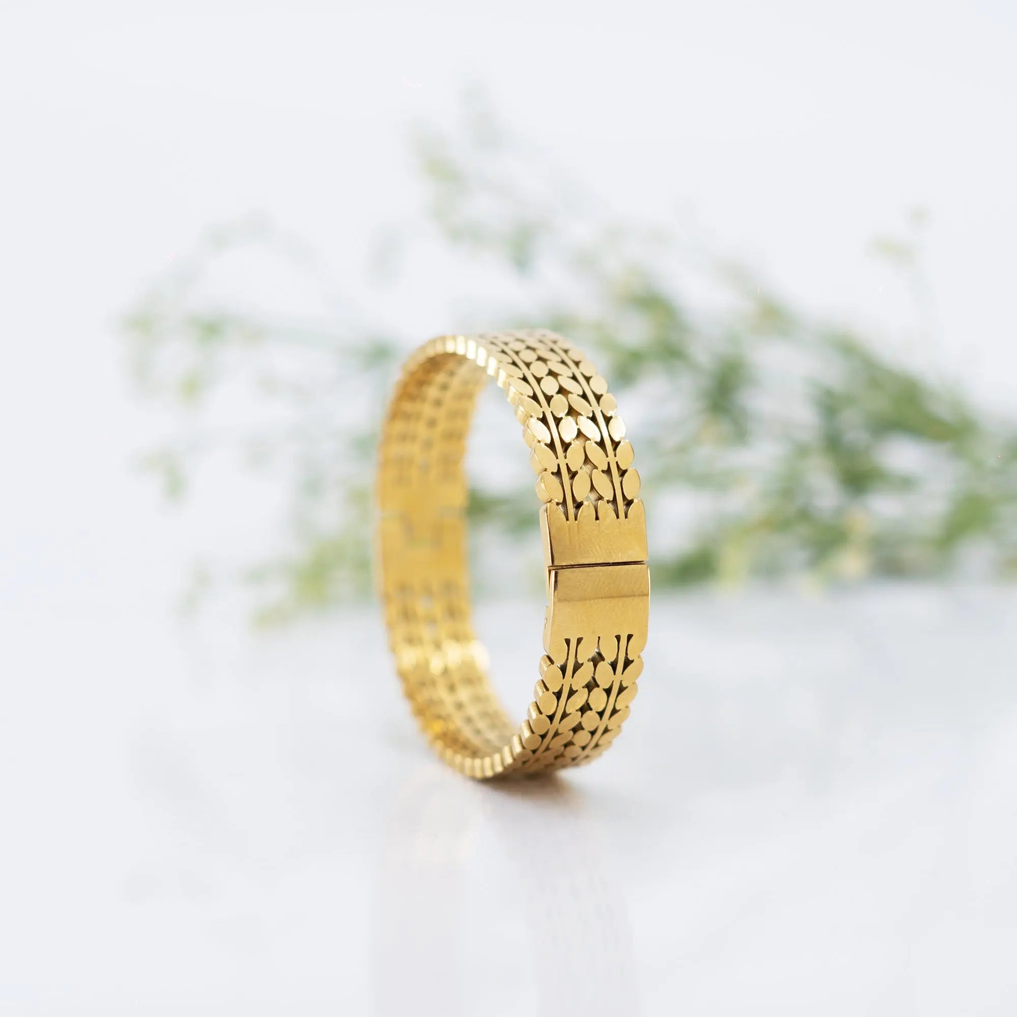 Trendy gold-plated designer bracelet for women – premium fashion jewellery with intricate link pattern, perfect for wedding, festive looks, or daily wear styling by Own It Pure.