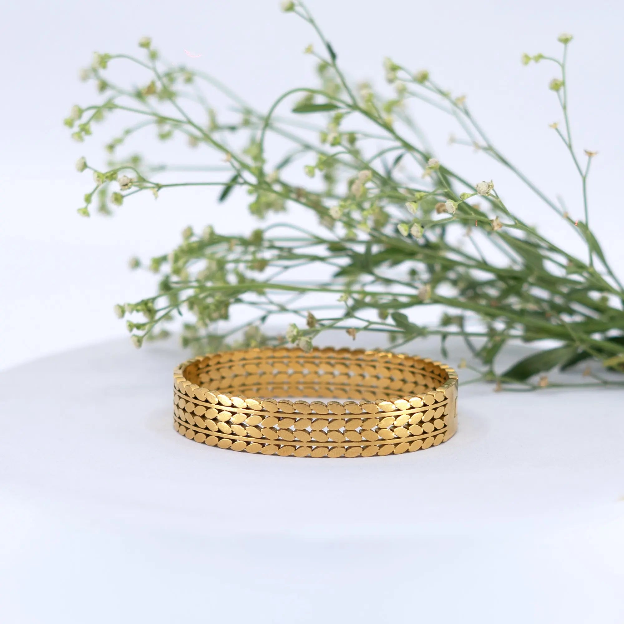 Trendy gold-plated designer bracelet for women – premium fashion jewellery with intricate link pattern, perfect for wedding, festive looks, or daily wear styling by Own It Pure.