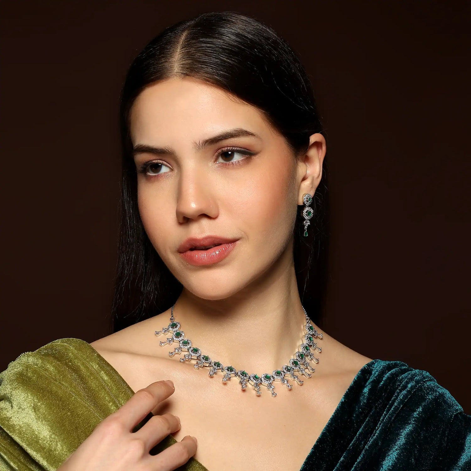 Elara Green emerald green diamond style necklace set with silver finish worn by model
