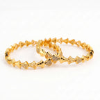 Kanak Wave Bangles – Gold Wave Design Bangles with Multicolour Stones