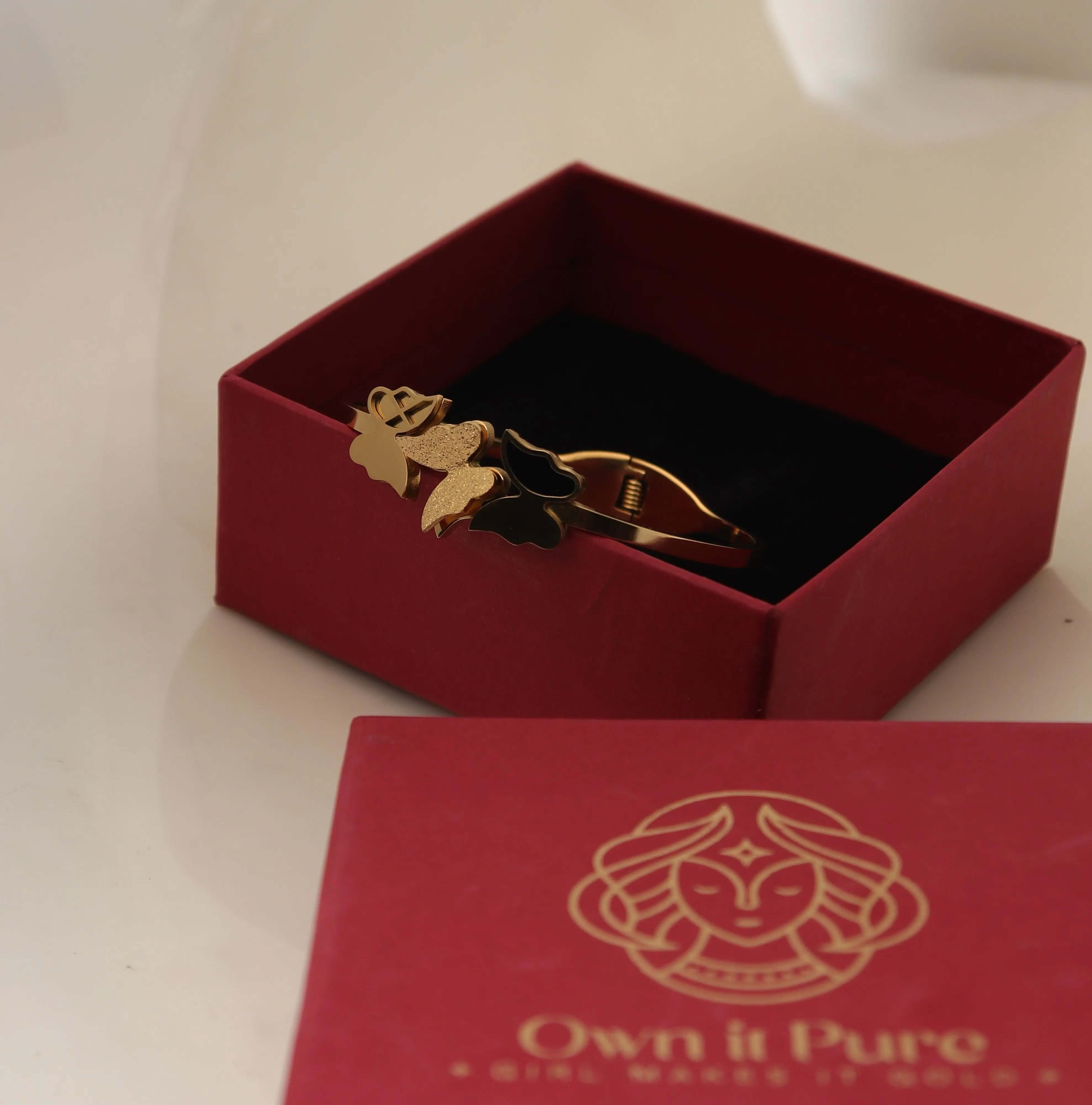 Elegant butterfly design gold-toned bracelet for women – stylish fashion jewellery with black enamel detail, perfect for partywear, festive outfits, and everyday glam by Own It Pure.