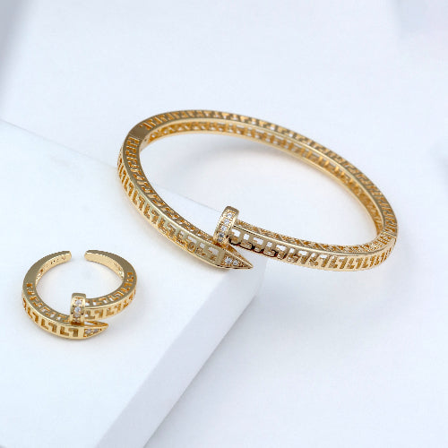 Luxury gold-plated open bangle bracelet and adjustable ring with Greek key design and sparkling cubic zirconia stones. Perfect for modern statement jewelry, minimalist accessories, and premium gift collections. open cuff bracelet, geometric jewelry, statement ring, premium fashion accessories)