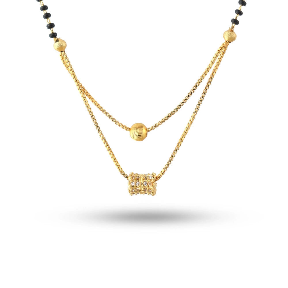 Gold necklace with a pendant on a white background