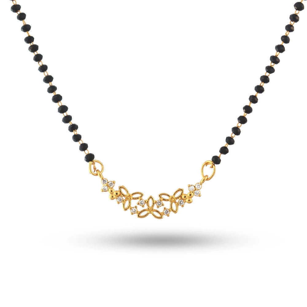 Black beaded necklace with a gold clasp on a white background