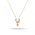 Gold necklace with a cat-shaped pendant on a white background