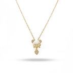 Gold necklace with a cat-shaped pendant on a white background