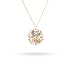 Gold necklace with a floral pendant on a white background