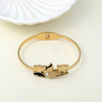 Elegant butterfly design gold-toned bracelet for women – stylish fashion jewellery with black enamel detail, perfect for partywear, festive outfits, and everyday glam by Own It Pure.