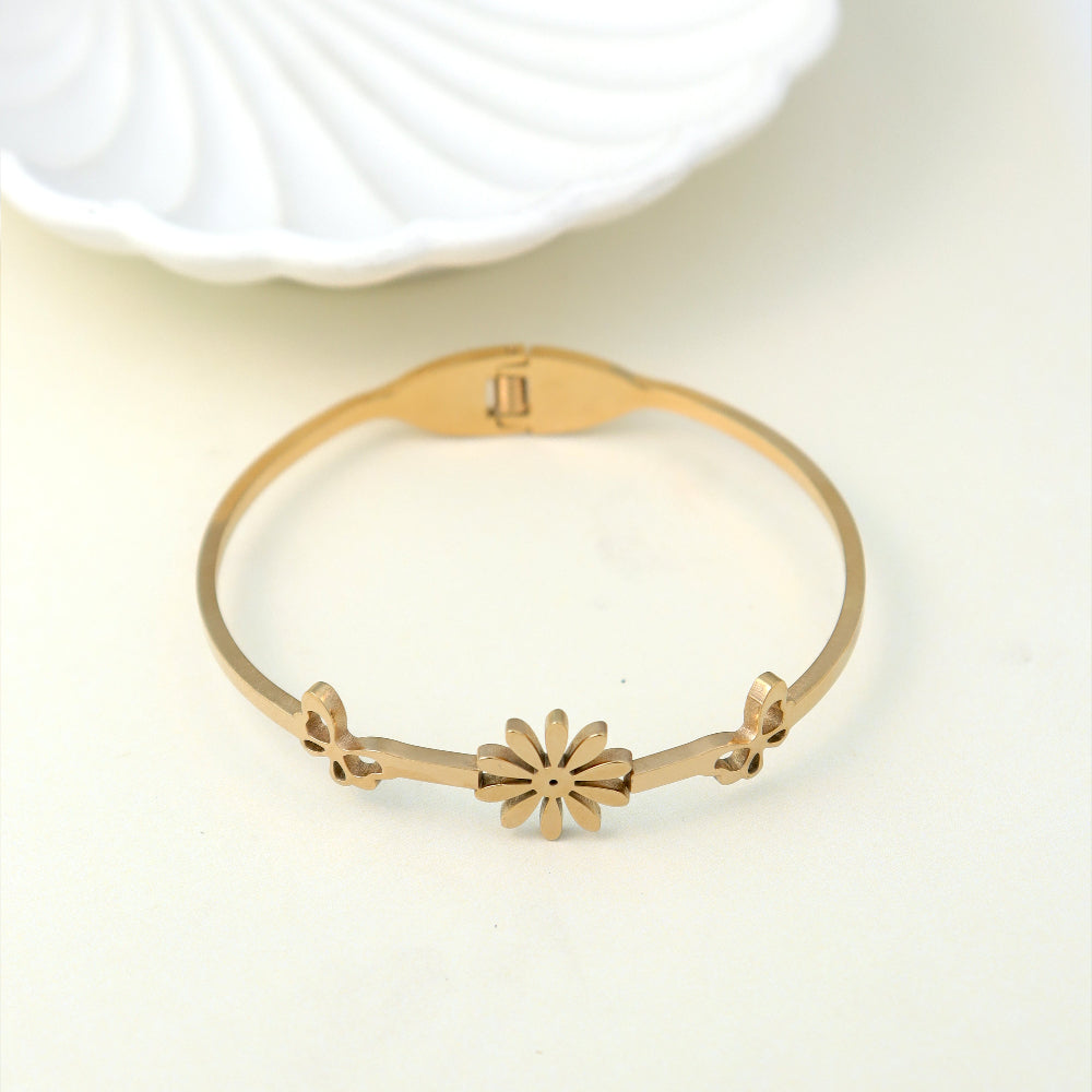 Trendy gold-plated floral bangle bracelet for women – lightweight designer fashion jewellery perfect for daily wear, casual outings, and festive occasions by Own It Pure.