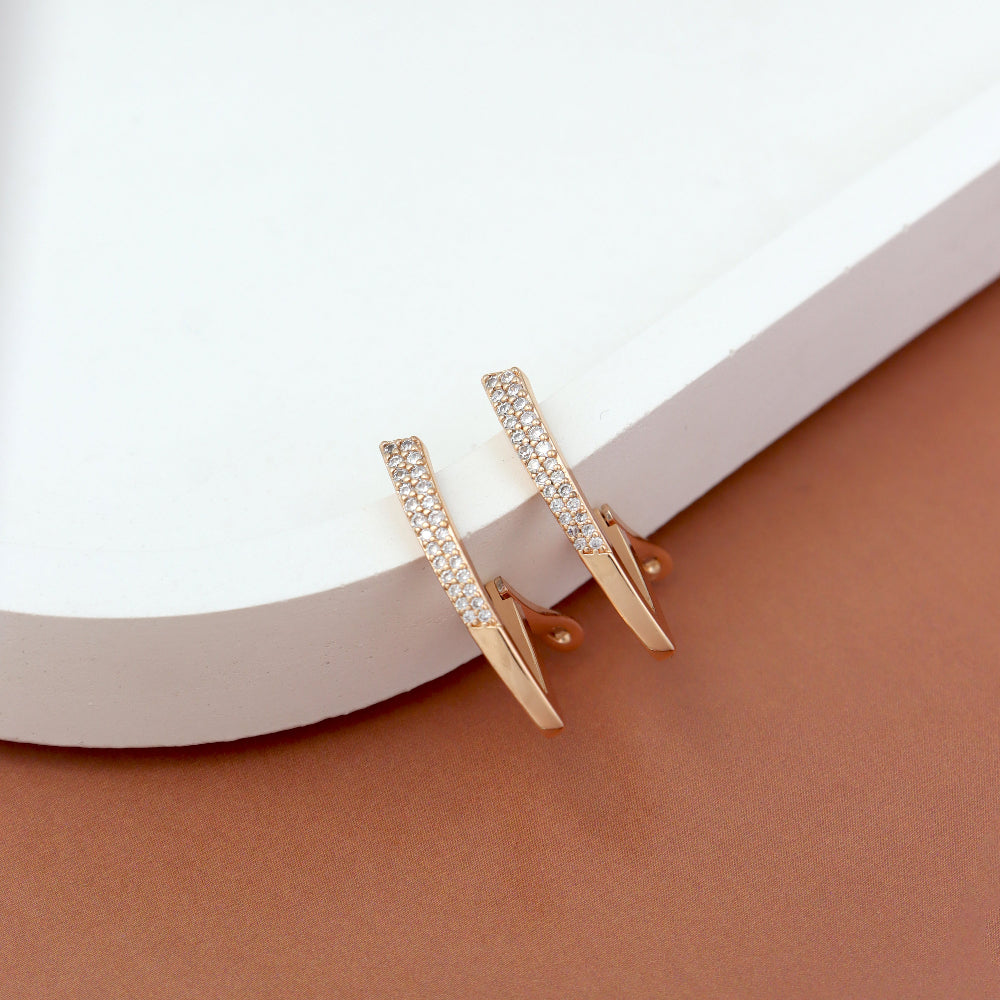 Elegant rose gold American diamond earrings for women – premium fashion jewellery with sleek modern design, ideal for parties, weddings, or festive wear by Own It Pure.