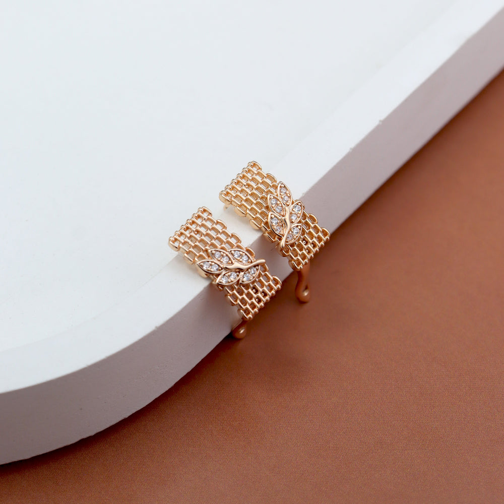 Contemporary gold mesh design earrings with sparkling leaf-shaped American diamond accents – stylish statement earrings for women, perfect for festive and party wear by Own It Pure.