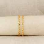 Golden Twirl Cubic Zirconia Gold-Plated Twisted Bangles