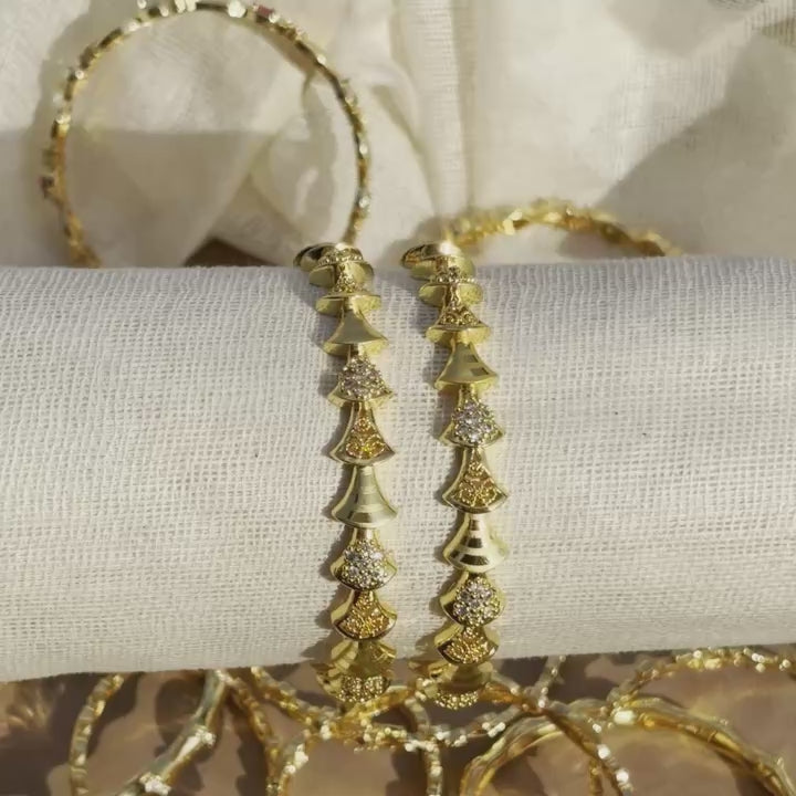 Kanak Wave Bangles – Gold Wave Design Bangles with Multicolour Stones